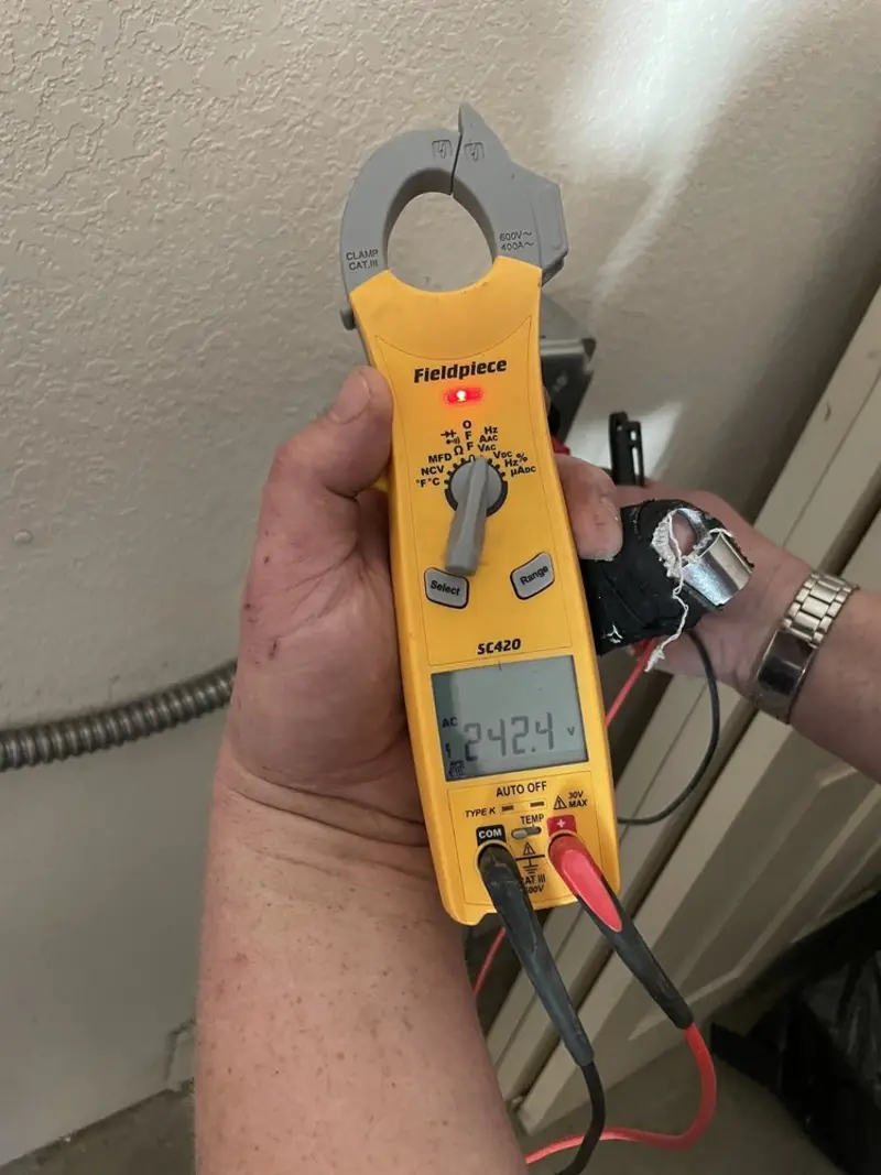 Voltage testing with clamp meter during Outlet Installation in Lemon Grove
